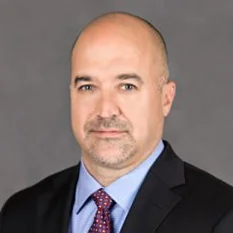 Tom Kenaley — Co-Founder and President of KORE1